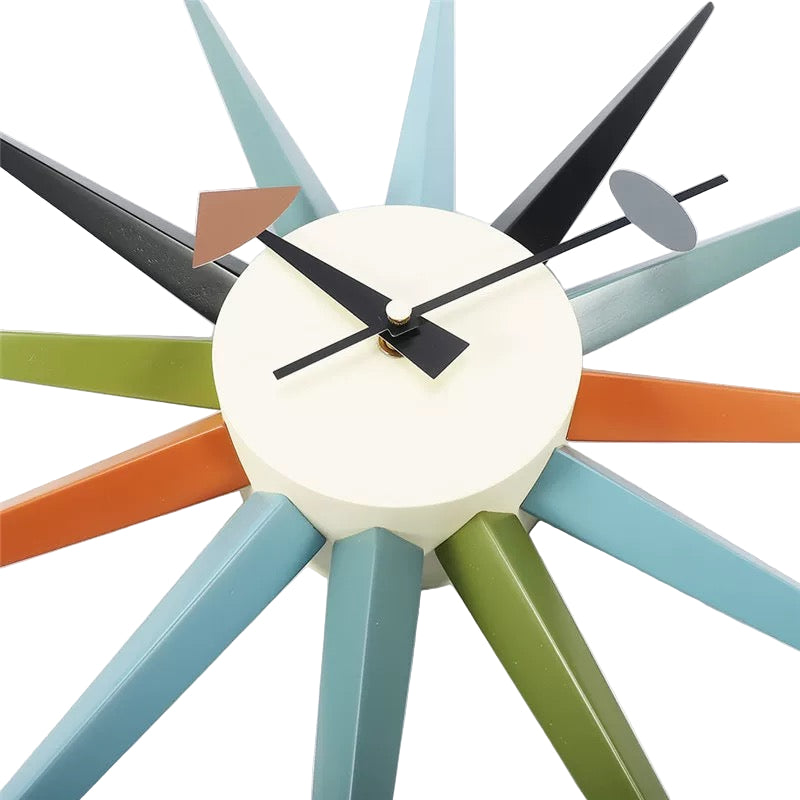 Colorful wall clock with black hands on a white background