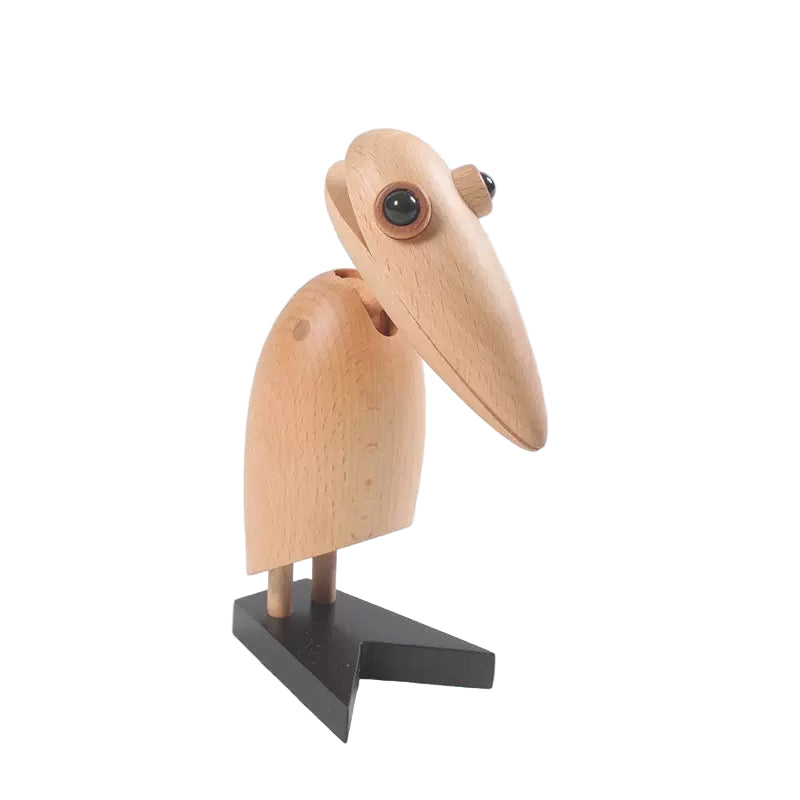 Wooden bird figurine on a white background