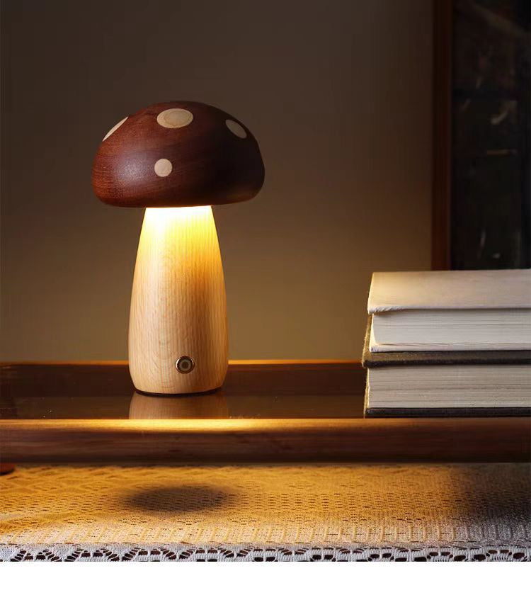 Mushroom-shaped lamp on a wooden surface with books in the background