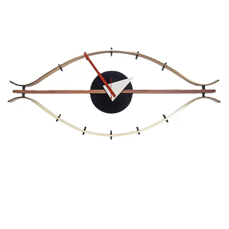 Modern wall clock with eye design on a white background