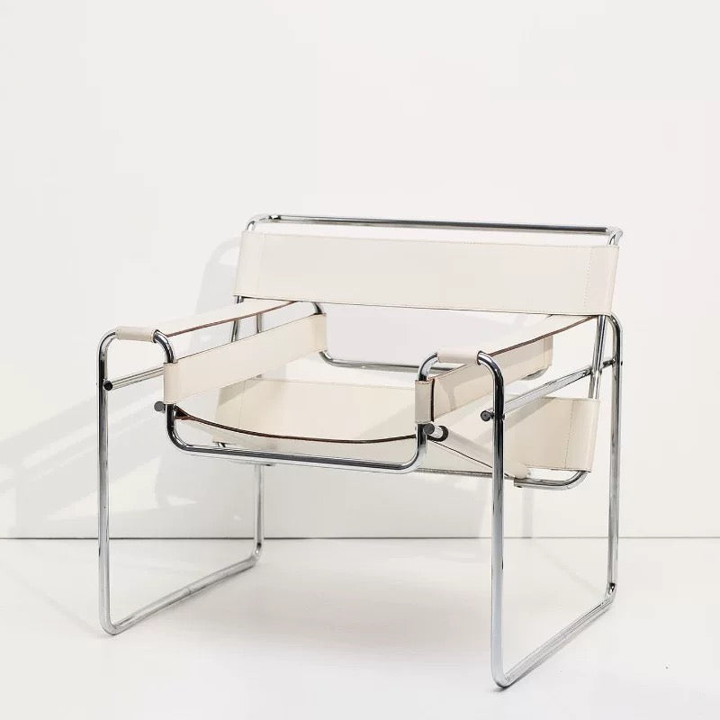 Modern chair with transparent backrest and white seat on a white background