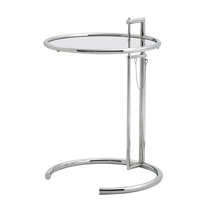 Chrome side table with a round glass top on a white background