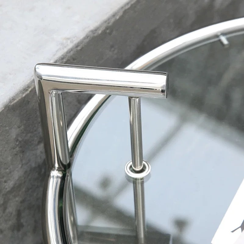 Close-up of a metallic railing with a blurred background