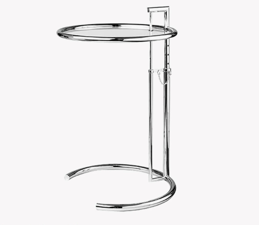 Modern side table with a clear glass top and chrome frame on a white background