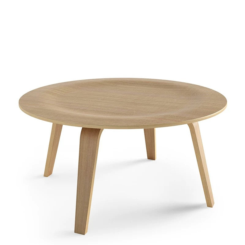 Round wooden table with four legs on a white background