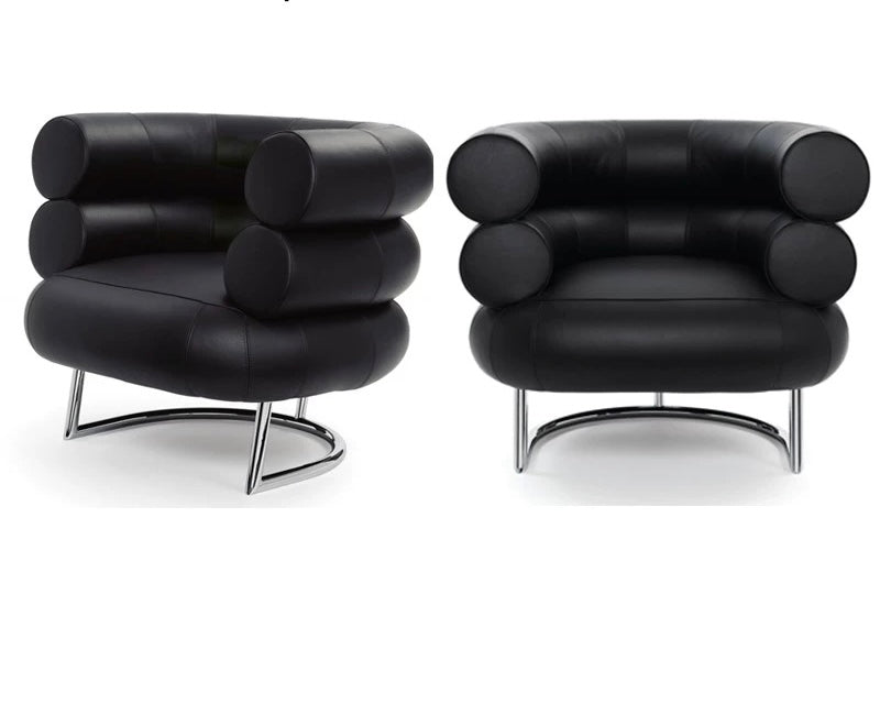 Two black modern chairs with chrome legs on a white background