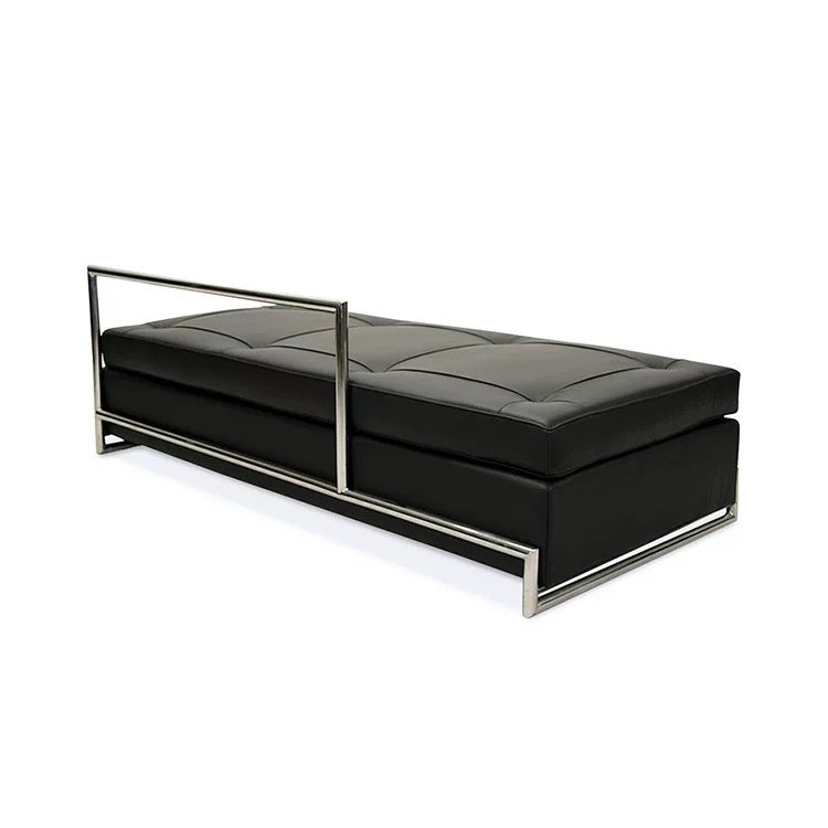 Black leather bench with metal frame on a white background