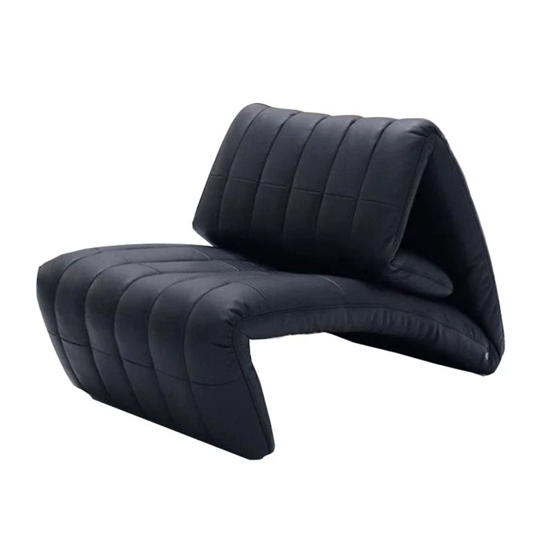 Black quilted seat cover on a white background