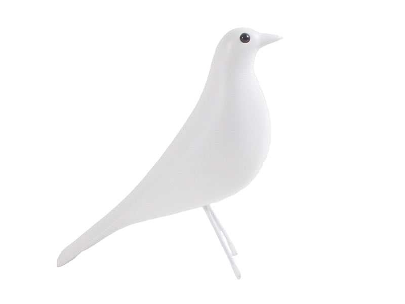 White bird-shaped object on a light gray background