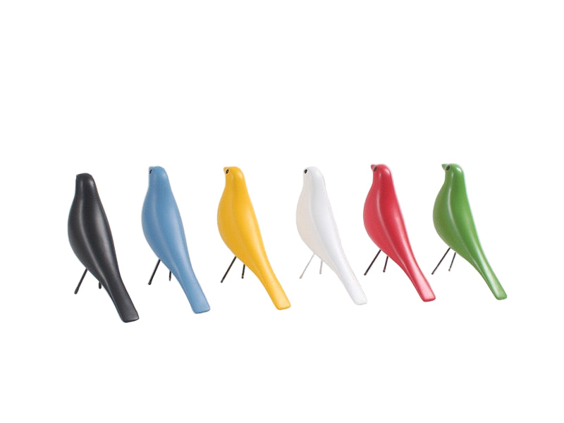 Set of six colorful bird-shaped sculptures on a light gray background