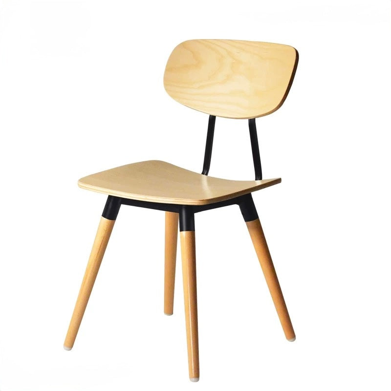 Wooden chair with black accents on a white background