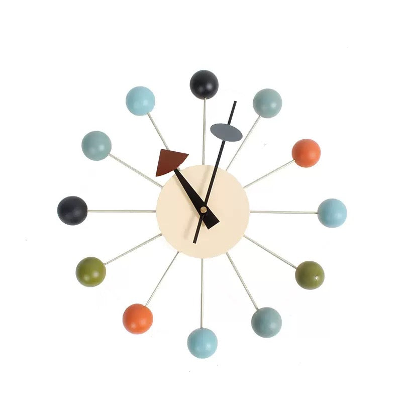 Colorful wall clock with spherical design on a white background