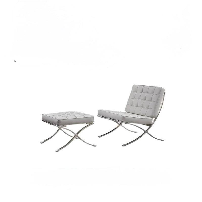 Gray chair and ottoman set on a white background
