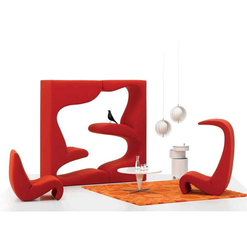 Modern red sofa with unique design in a minimalistic setting