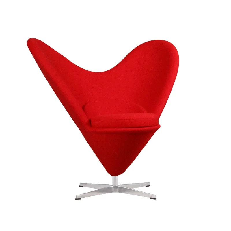 Red heart-shaped chair with a white background