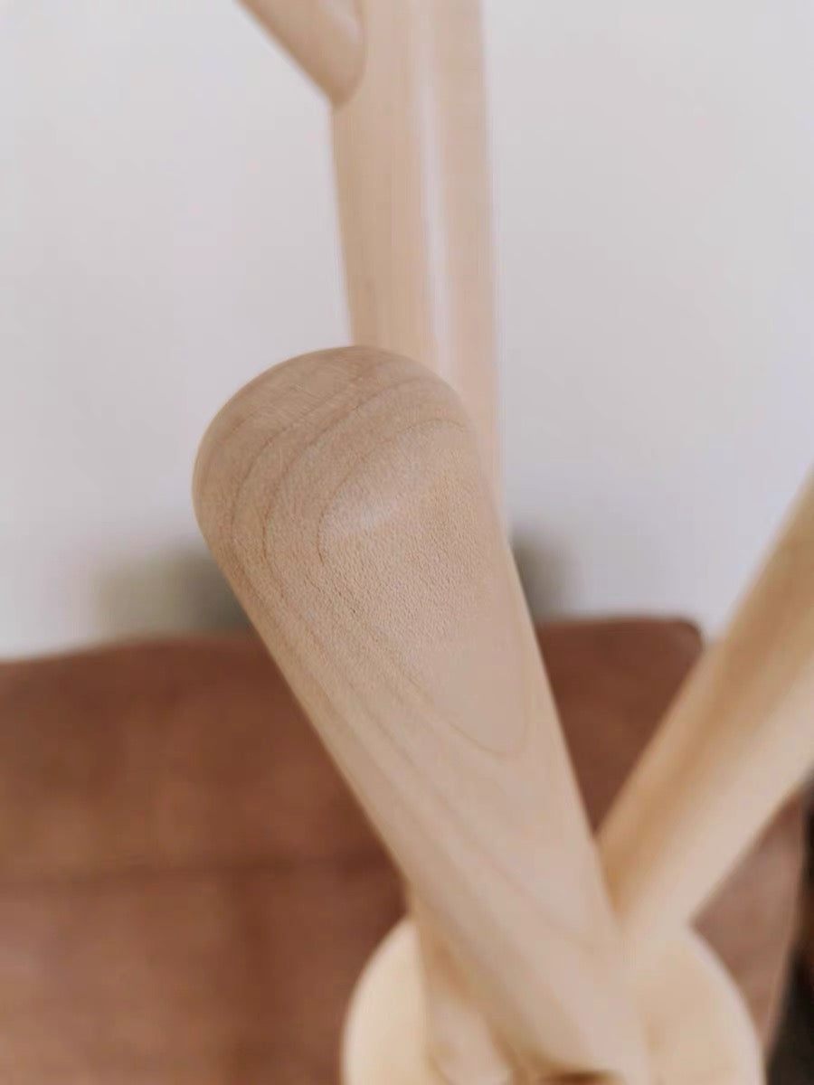 Close-up of a wooden chair with a blurred background