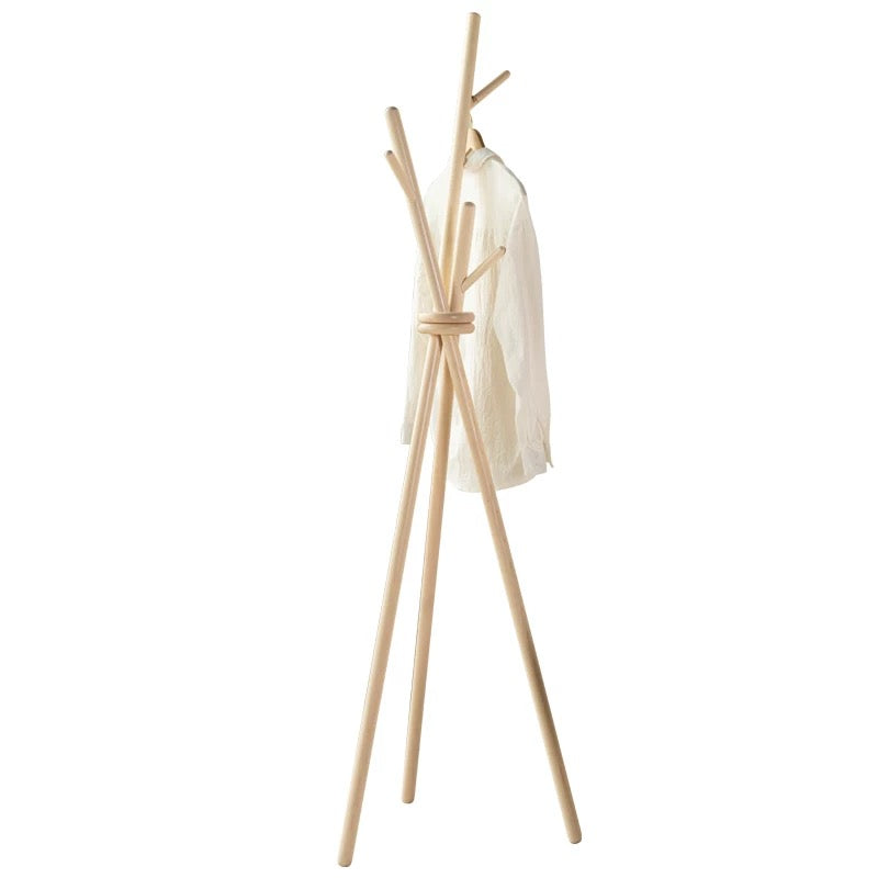 Wooden coat rack with multiple hooks on a white background