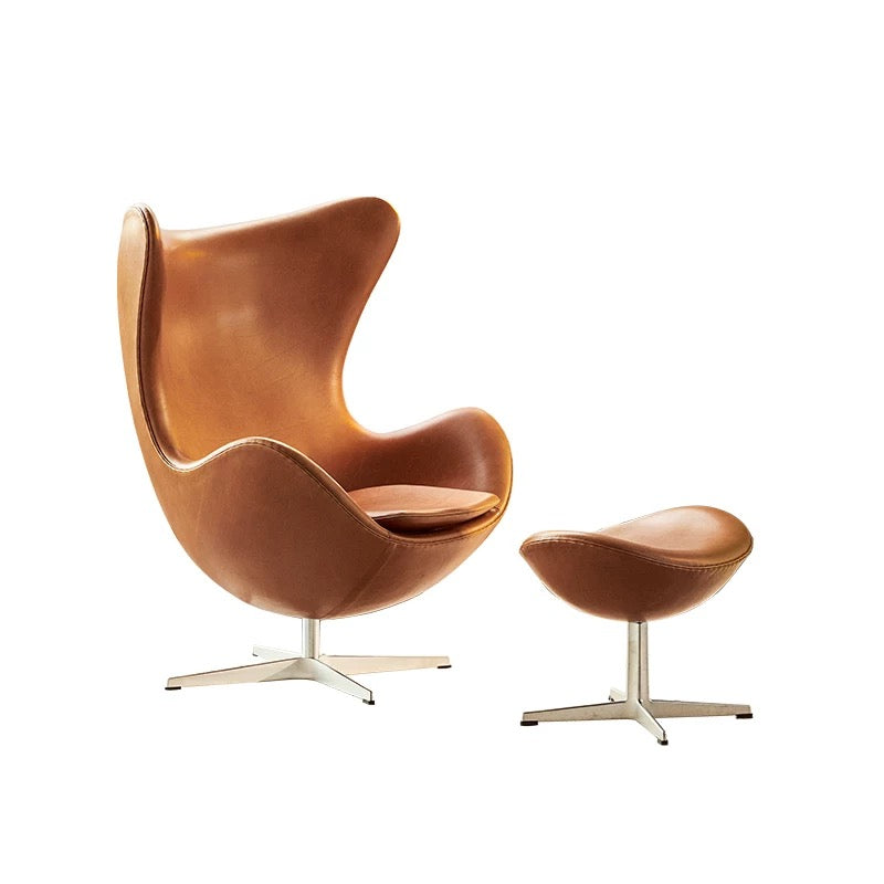 Brown egg-shaped chair with matching ottoman on a white background