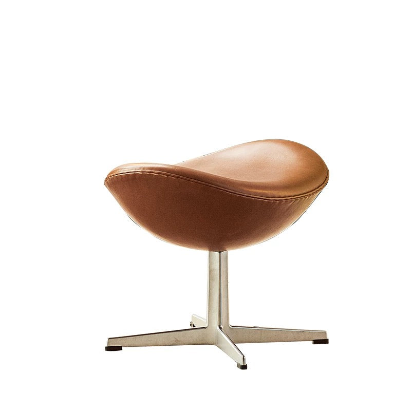 Brown leather stool with a metal base on a white background