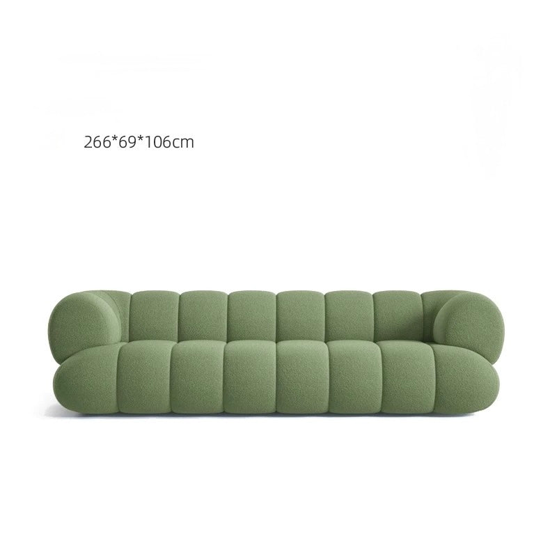 Green sofa with dimensions on a white background