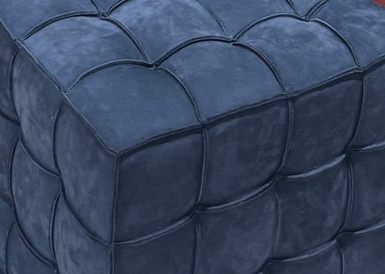 Close-up of a textured blue fabric surface